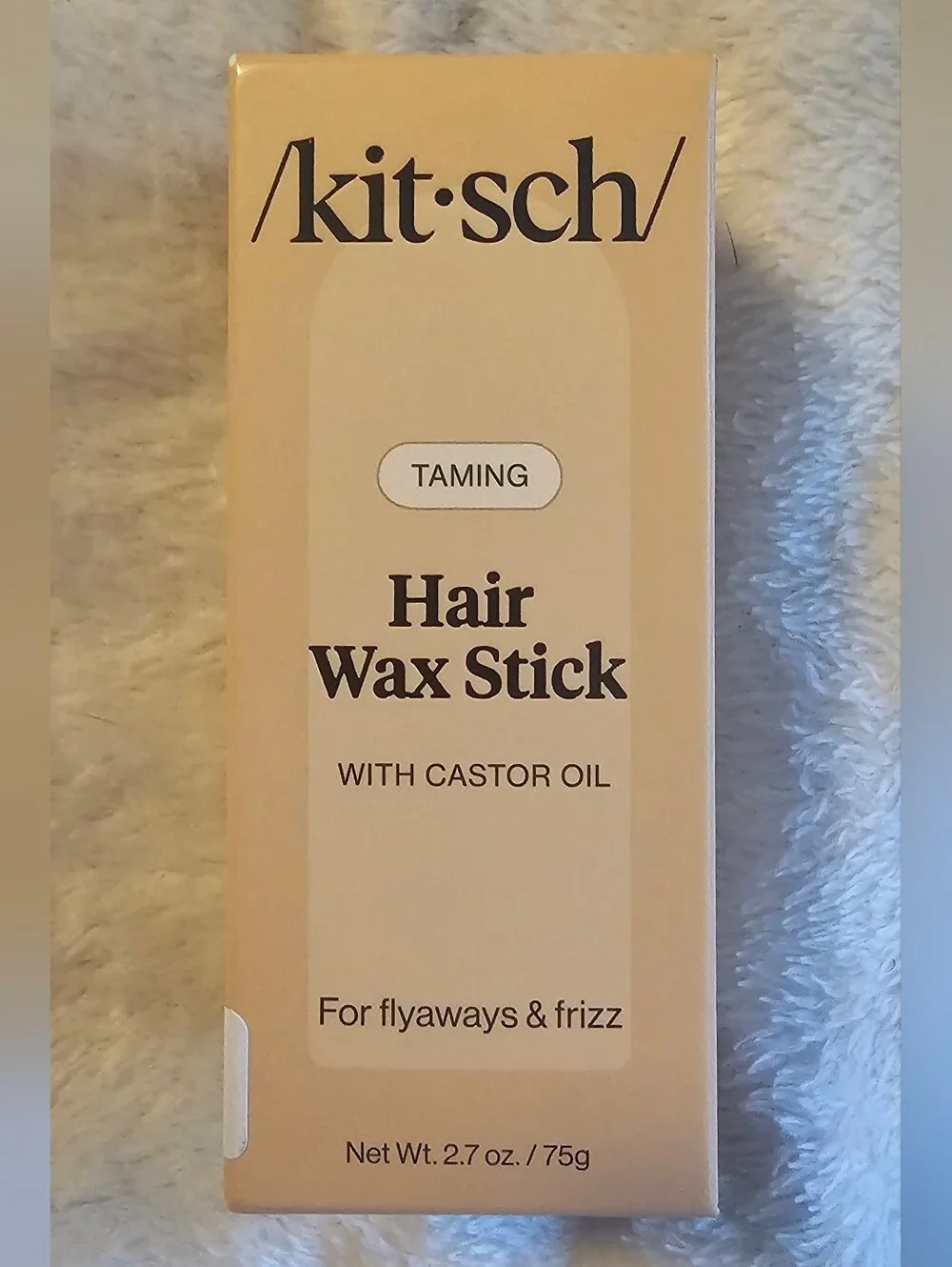 Kitsch smooths flyaways